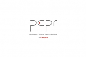 Logo Powiatowego Centrum Pomocy Rodzinie w Cieszynie szary napis.